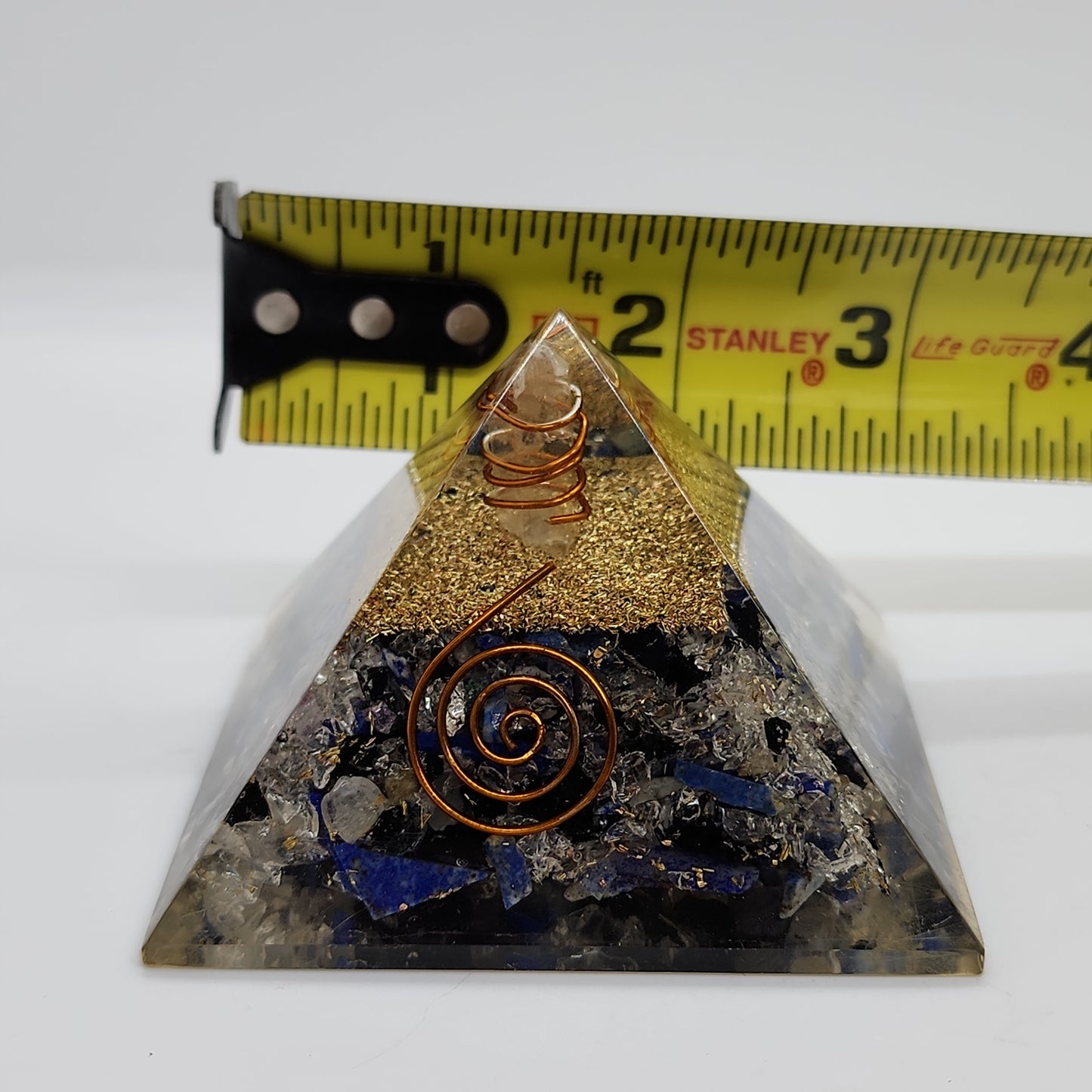 Orgone Pyramid Sodalite chips with Clear Quartz point